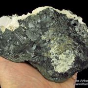 Manganoan Calcite (fl) on Tennantite and Sphalerite, with Pyrite