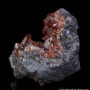Rhodochrosite with Fluorite on Quartz