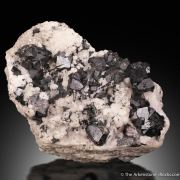 Cassiterite, Tourmaline, and Orthoclase