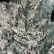 Allargentum after Dyscrasite on Calcite
