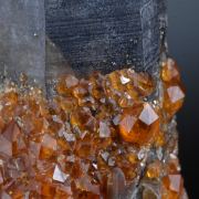 Spessartine on Smoky Quartz