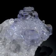 Fluorite - stepped cubo-octahedral on Quartz