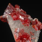Realgar crystals on Calcite