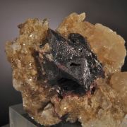 Cinnabar (twinned crystals on Quartz and Calcite)