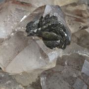 Epidote (flower form) on phantom Quartz