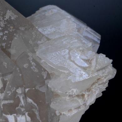 Hambergite on Smokey Quartz