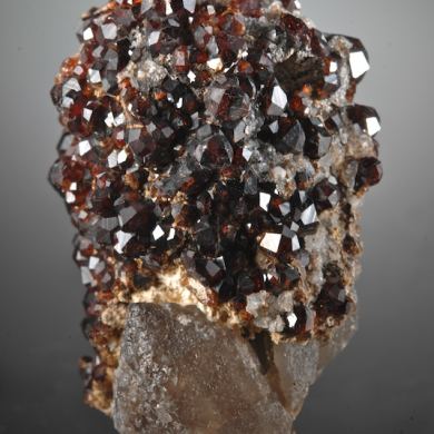 Spessartine on Hyalite Opal and Quartz