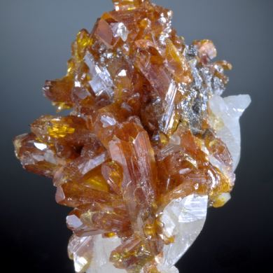 Orpiment -gemmy crystals on Calcite