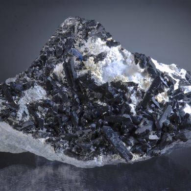 Neptunite with Benitoite on Natrolite