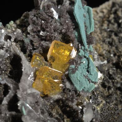 Wulfenite, Hemimorphite, Rosasite, Aurichalcite and Malachite
