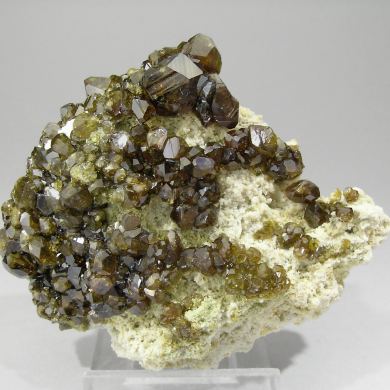 Andradite (variety topazolite) with Stilbite