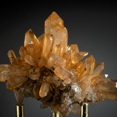 Quartz - red crystals enclosing Hematite