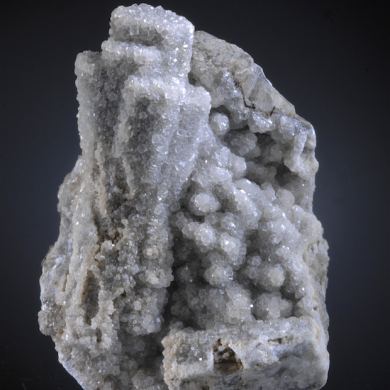 Calcite over/replacing Aragonite