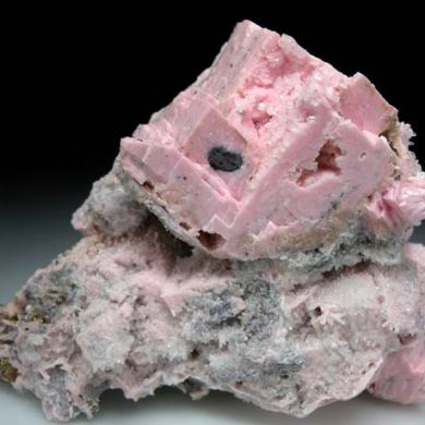 Rhodochrosite after Calcite