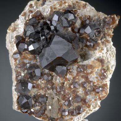 Spessartine on Microcline 