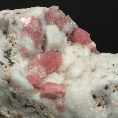 Rhodochrosite on Quartz
