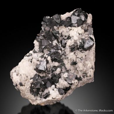 Cassiterite, Tourmaline, and Orthoclase