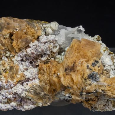 Roweite with Olshanskyite, Andradite and Calcite