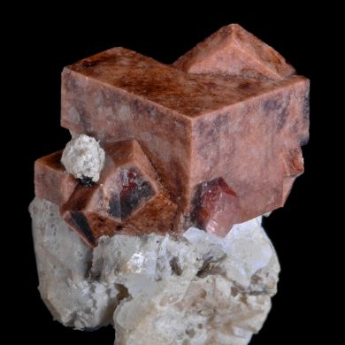 Rhodochrosite on Analcime