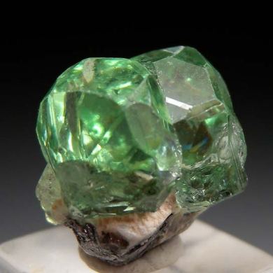 Tsavorite on Graphite
