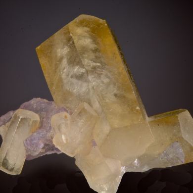 Calcite (Pineapple) on Fluorite
