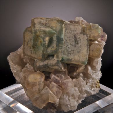 Fluorite - zoned crystals on Quartz