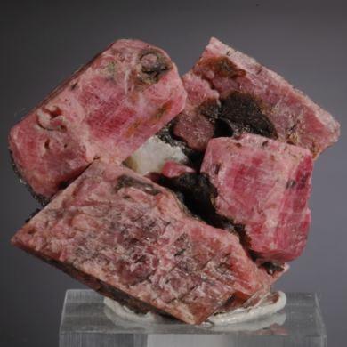 Rhodonite (blocky crystals with minor Franklinite, Calcite)