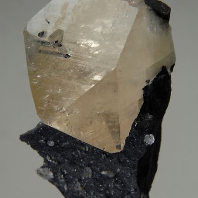 Calcite included by Stibnite