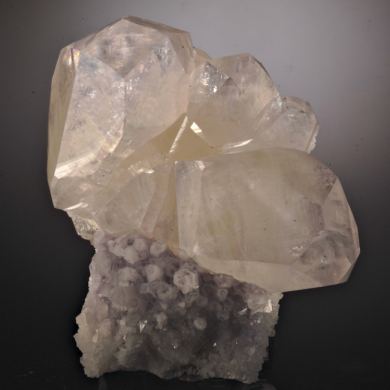 Calcite on Quartz (Amethyst)