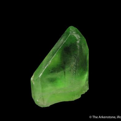 Peridot included by Ludwigite