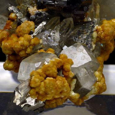 Cassiterite, apatite, arsenopiryte, quartz, siderite