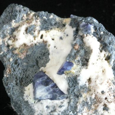 Benitoite with Joaquinite on Natrolite