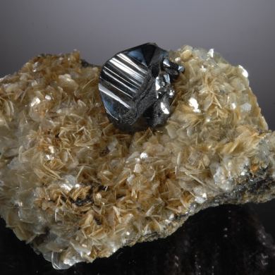 Cassiterite on Muscovite