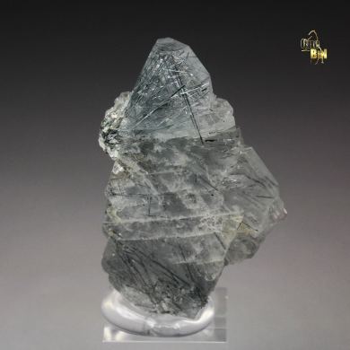 ALBITE with RIEBECKITE inclusions