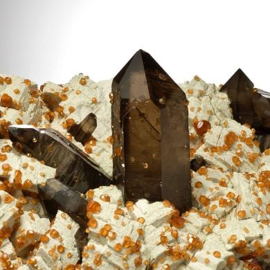 Spessartine Garnet and Smoky Quartz on Feldspar