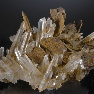 Siderite (pseudomorphing to Limonite) on Quartz