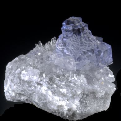 Fluorite - stepped cubo-octahedral on Quartz