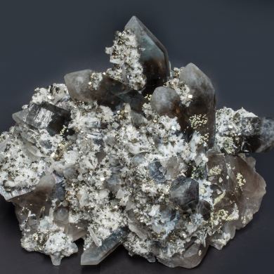 Bertrandite with Quartz (variety smoky) and Pyrite