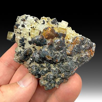 Goethite replacing Siderite on Quartz with Fluorite