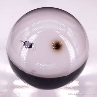 Quartz sphere with Thorite inclusion