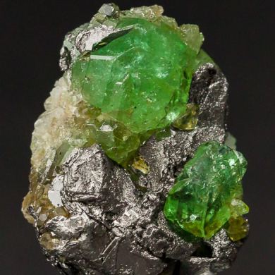 Tsavorite on Graphite