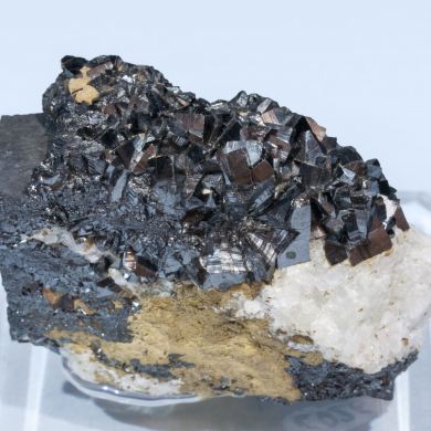 Bixbyite with Sturmanite and Calcite