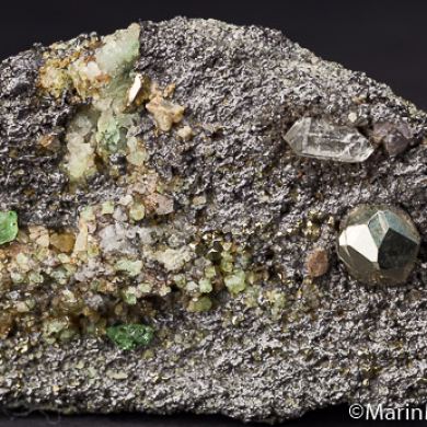 Tsavorite, Pyrite, Quartz, Diopside on Graphite