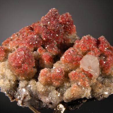 Calcite enclosing Hematite (2 generations)