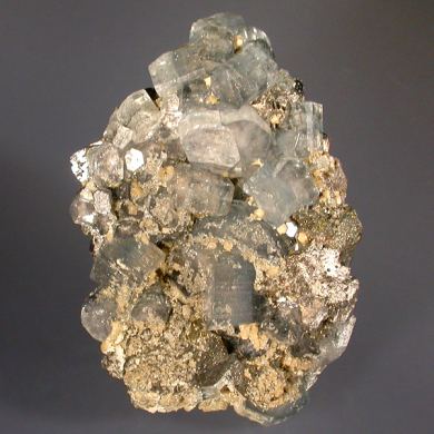 Fluorapatite with Siderite, Muscovite & Pyrite on Arsenopyrite