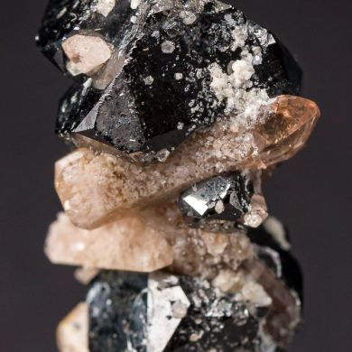 Topaz on Bixbyite