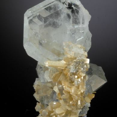 Beryl V. Goshenite -Aquamarine on Muscovite