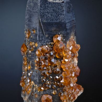 Spessartine on Smoky Quartz