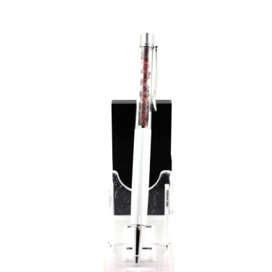 Raw Rhodolite Garnet mineral pen Madagascar.