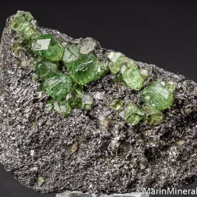 Tsavorite on Graphite
